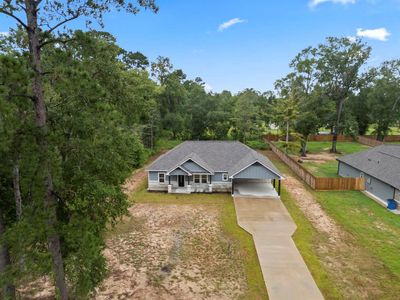 New construction Single-Family house 318 County Road 2221, Cleveland, TX 77327 - photo 3 3