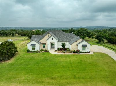 New construction Single-Family house 1033 Timber Hills Drive, Weatherford, TX 76087 - photo 0 0