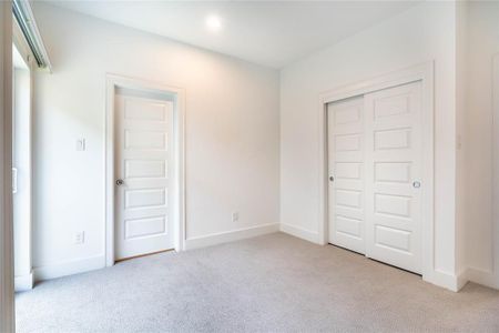 First-floor bedroom closet and bathroom