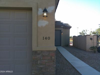 New construction Townhouse house 846 N Pueblo Drive, Unit 140, Casa Grande, AZ 85122 - photo 0