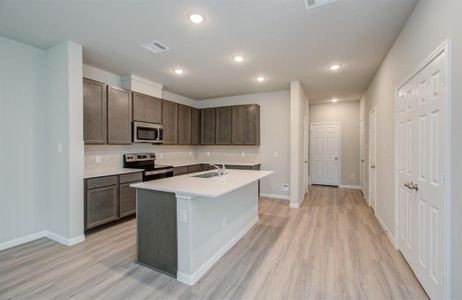 Island kitchen with counter seating