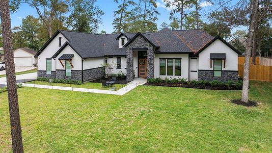 FRONT ELEVATION IN STONE & STUCCO