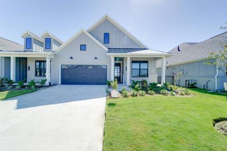 New construction Townhouse house 10302 Water Harbor Drive, Missouri City, TX 77459 Reflection- photo 0