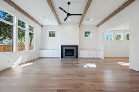 Great room with 13' ceilings and white oak beams