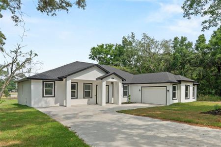 New construction Single-Family house 3944 White Heron Drive, Orlando, FL 32808 - photo 0
