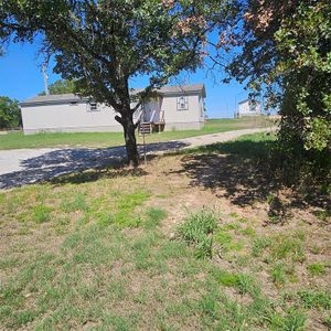 New construction Mobile Home house 250 County Road 3940, Poolville, TX 76487 - photo 0