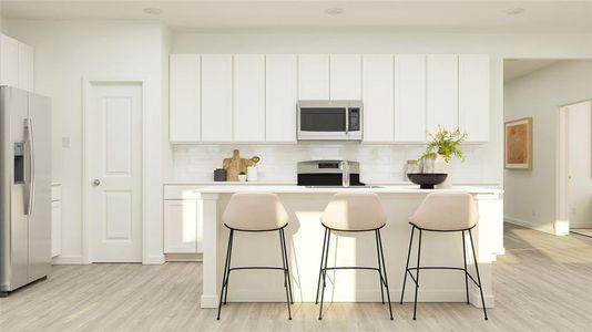 Kitchen with appliances with stainless steel finishes, light wood-type flooring, a breakfast bar, a center island with sink, and white cabinetry