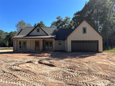 New construction Single-Family house 11386 Greenway Drive, Plantersville, TX 77363 - photo 0