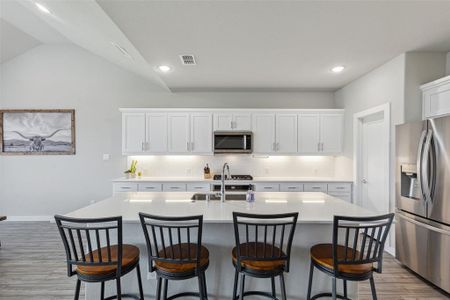 Dine-in kitchen with space at the island.