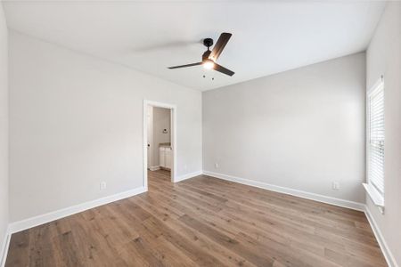 Master bedroom with an ensuite bathroom.