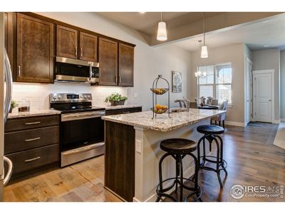 New construction Townhouse house 4140 Trapper Lake Dr, Loveland, CO 80538 Camden- photo 1 1