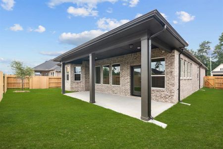 EXAMPLE PHOTO: Large covered patio is wired for music speakers and plumbed for gas!