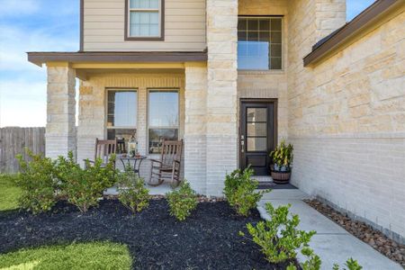 Charming front porch with space for rocking chairs as shown above, perfect for relaxing and enjoying peaceful mornings and sunsets.