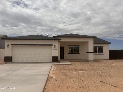 New construction Single-Family house 13510 S Kashmir Road, Arizona City, AZ 85123 - photo 0