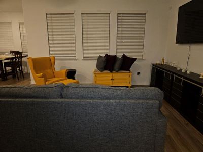 Living room featuring dark wood-type flooring