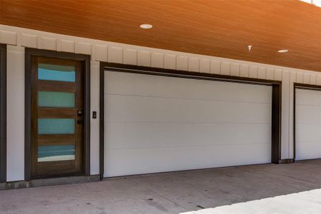 Garage with wooden ceiling