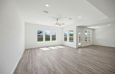 Airy gathering room with large windows *real home pictured