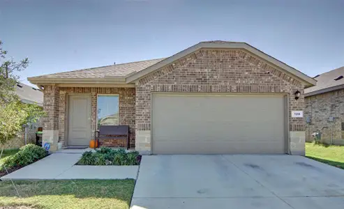 Ranch-style home with a garage