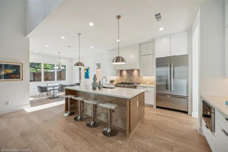 Open concept kitchen with JennAir appliances