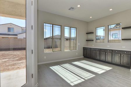 New construction Single-Family house 11807 West Luxton Lane, Avondale, AZ 85323 - photo 9 9