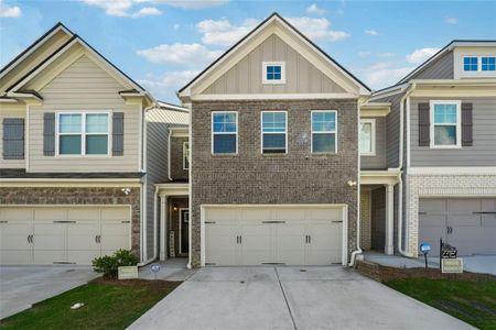 New construction Townhouse house 7759 Squire Court, Fairburn, GA 30213 - photo 0 0