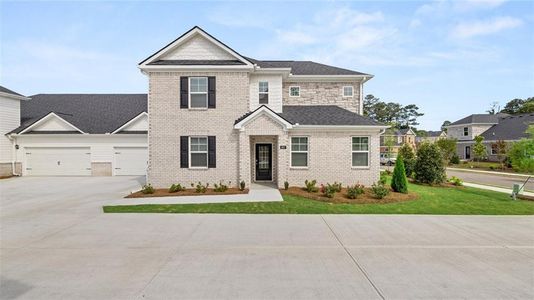 New construction Townhouse house 570 Silver Moon Drive, Loganville, GA 30052 Bennett- photo 0