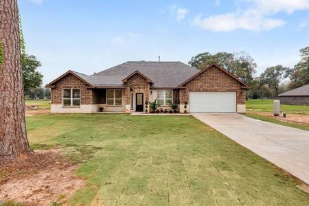 New construction Single-Family house 13920 Wigginsville Road, Conroe, TX 77302 - photo 0 0
