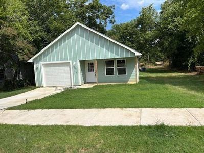 New construction Single-Family house 825 W Walker Street, Denison, TX 75020 - photo 0