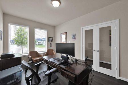 Just off the entryway sits your spacious study.  The two large windows in the study provide plenty of natural lighting in this space.