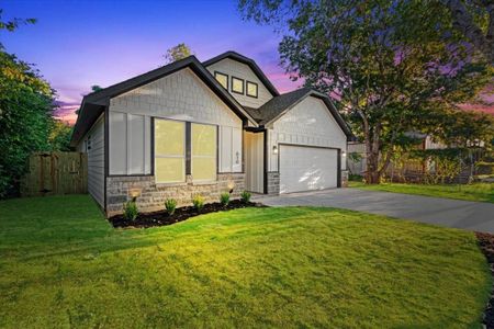 View of front of house with a lawn