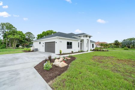 New construction Single-Family house 17568 Valencia Boulevard, The Acreage, FL 33470 - photo 2 2