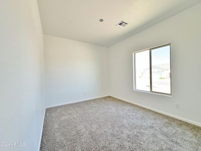New construction Single-Family house 9240 W Hartigan Lane, Arizona City, AZ 85123 - photo 18 18