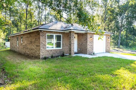 New construction Single-Family house 7945 Pipit Avenue, Jacksonville, FL 32219 - photo 0