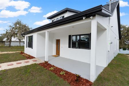 New construction Single-Family house 1042 Golden Bough Road, Lake Wales, FL 33898 - photo 0 0