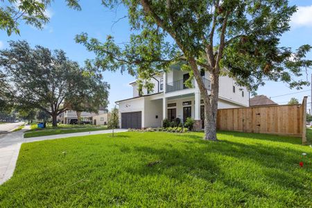 1345 Chamboard is located on a large CORNER LOT w/ front patio on 1st & 2nd floors. Enjoy the Classic Luxury from Wood Custom Homes.