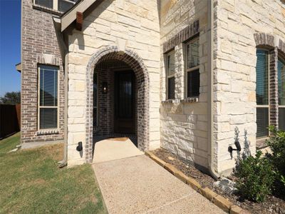 Property entrance featuring a yard