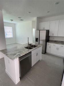 New construction Single-Family house 456 Cinnamon Drive, Poinciana, FL 34759 - photo 4 4