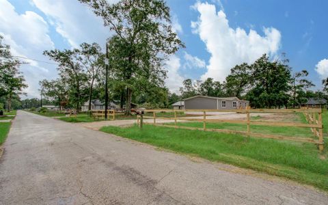 New construction Single-Family house 148 County Road 328, Cleveland, TX 77327 - photo 42 42