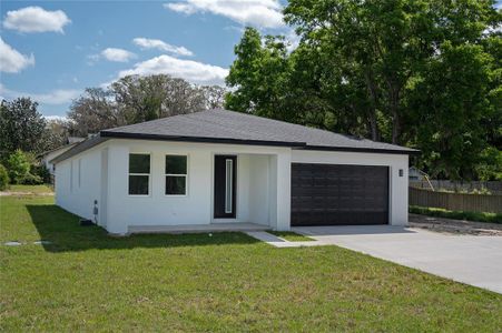 New construction Single-Family house 623 Butch Cassidy Lane, Eustis, FL 32726 - photo 4 4