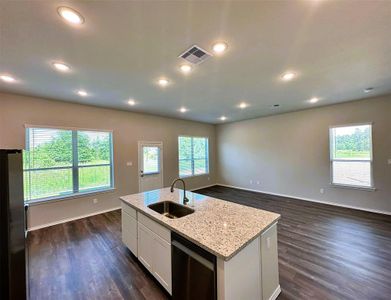 Open concept at is best- view from kitchen overlooking the dining & living room.