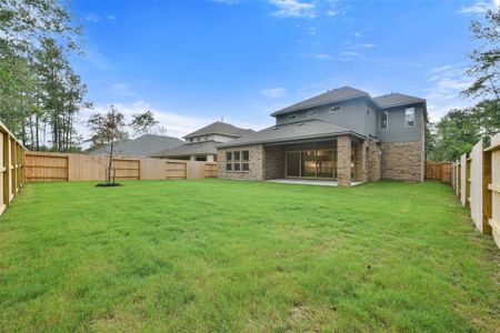 New construction Single-Family house 16146 Rustling Woods Road, Conroe, TX 77302 Plan 5051 Exterior D- photo 42 42