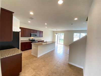 New construction Single-Family house 8747 Conoy Avenue, Polk City, FL 33868 - photo 5
