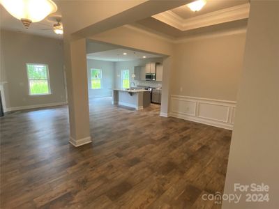 Dining Room into Family Room and Kitchen from Foyer. Representative Picture. Colors and Options may vary.
