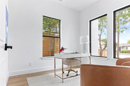 Office featuring hardwood / wood-style floors