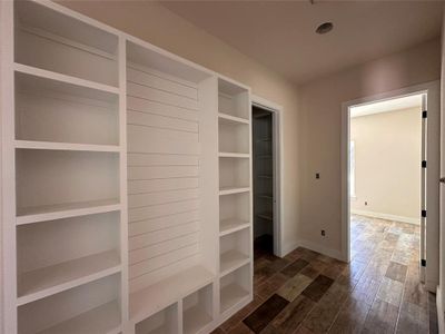 Great built-ins located in hallway between secondary bedrooms