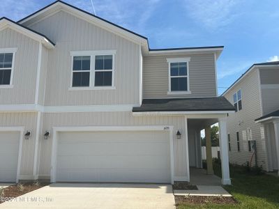New construction Townhouse house 6935 Mirage Street, Jacksonville, FL 32244 Sandalwood- photo 0