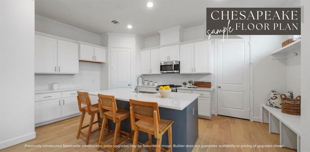 Culinary Paradise: A chef's dream kitchen awaits, featuring direct garage access for seamless transitions from car to culinary creation.