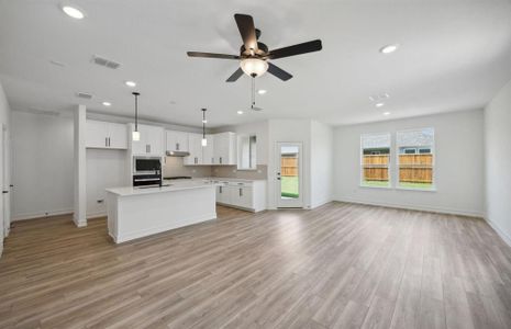 Open concept floor plan throughout *real home pictured