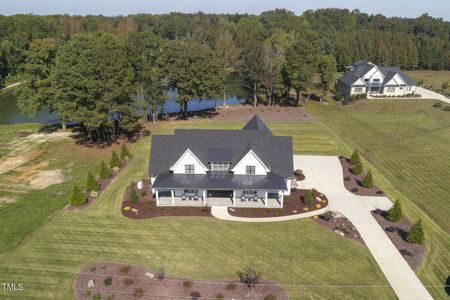 New construction Single-Family house 1941 Eddie Howard Road, Willow Springs, NC 27592 - photo 0