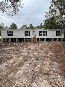 New construction Manufactured Home house 1168 Village Green Court, Jacksonville, FL 32234 - photo 0